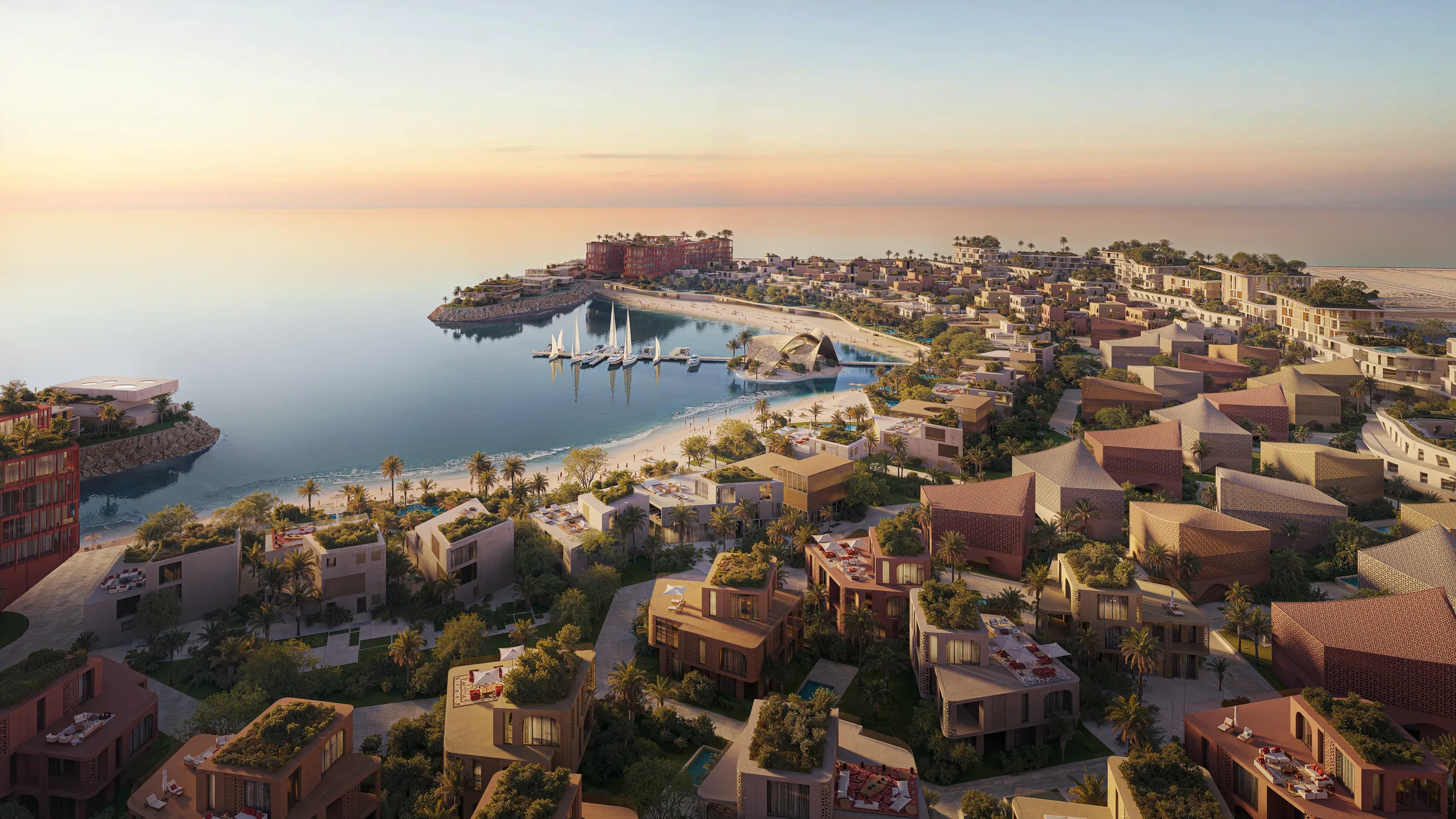 Mira Coral Bay at dusk, its clusters following the Al Mairid shoreline