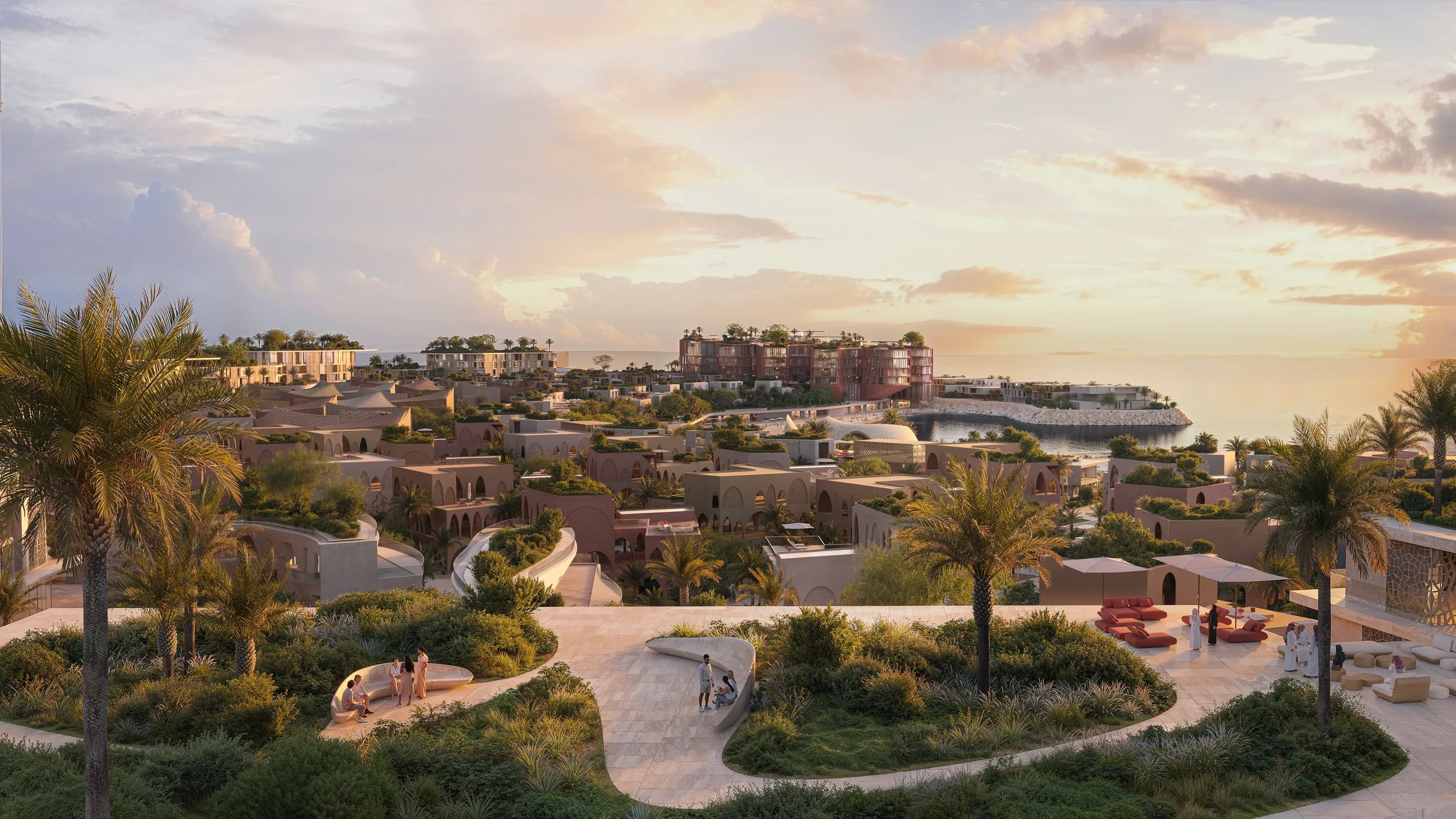 Villa clusters at Mira Coral Bay along the water at sunset